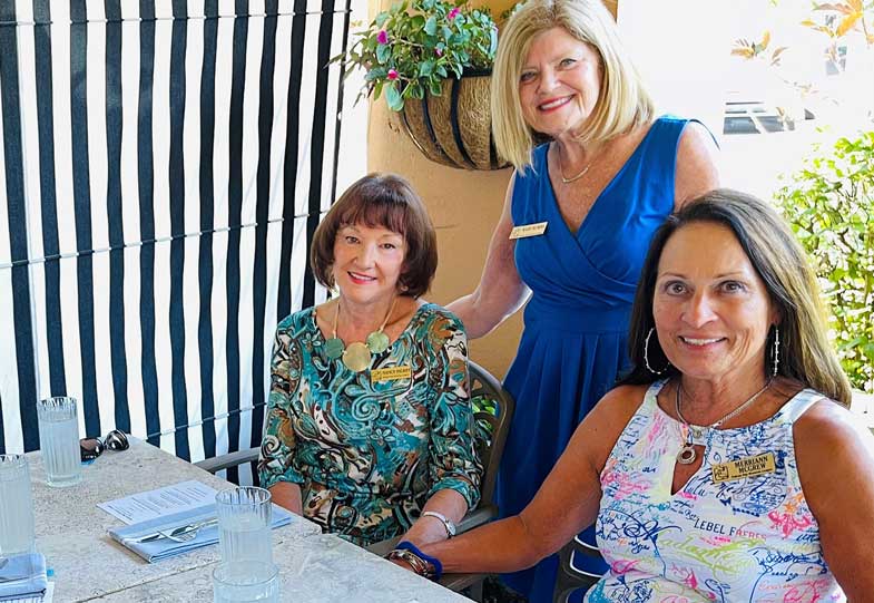 Pelican Bay Women's League President Mary Burns and other PBWL ladies attending a luncheon event
